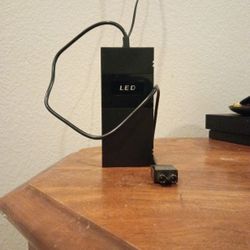 Xbox Power Box And Cord (LED) Flashes Through Colors.Donsr Not Have A Remote U Can Not Control The lED.