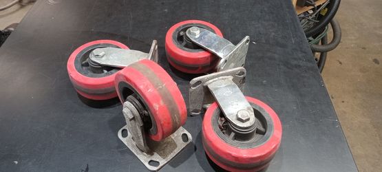 Heavy duty 5" quite roll casters.