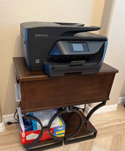 HP Officejet Pro 6968 color printer with wood table