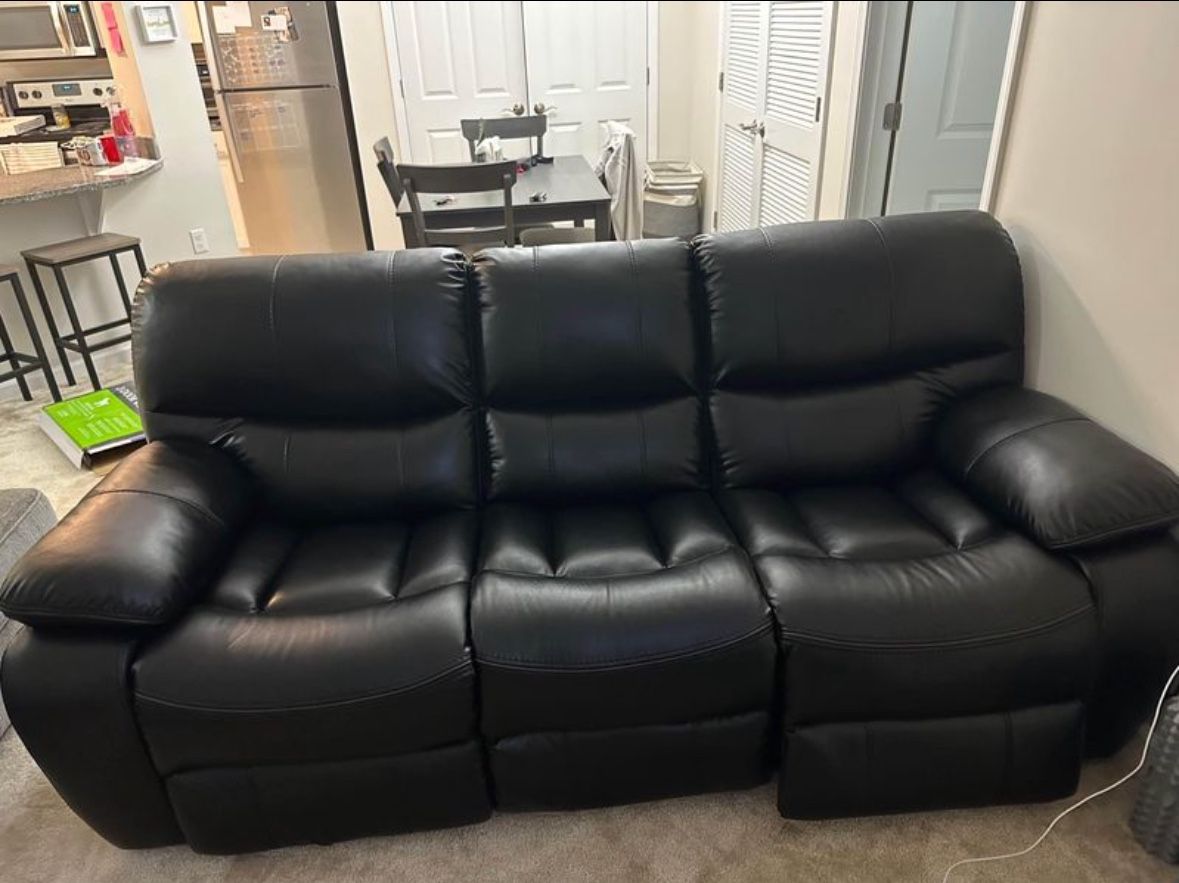 Basically new Black 89 Inch Power Reclining Sofa