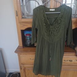 Assortment of dresses and sweaters.