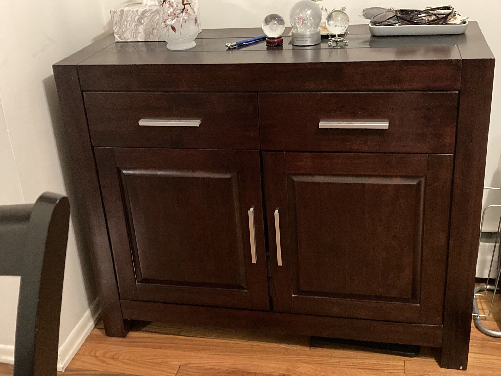 Dresser with pull out draws and shelves