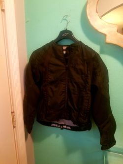 ICON MERC MOTORCYCLE JACKET WITH PADS...SIZE MED WOMENS...LIKE NEW!!