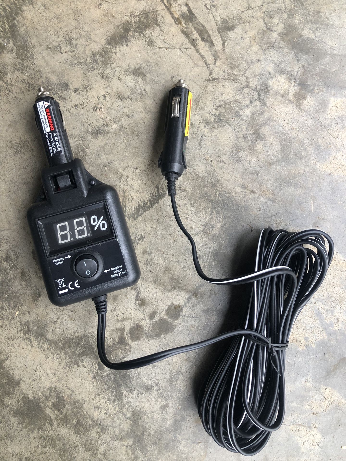 The image shows a Streetwize SWCG Charge and Go Car to Car Starter, also known as a Car to Car Jump Starter.