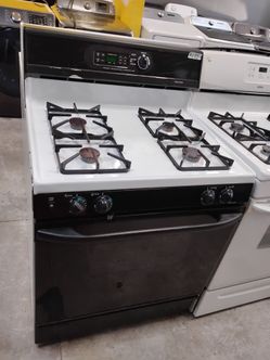 Cosmetic condition gas four burners everything works with warranty
