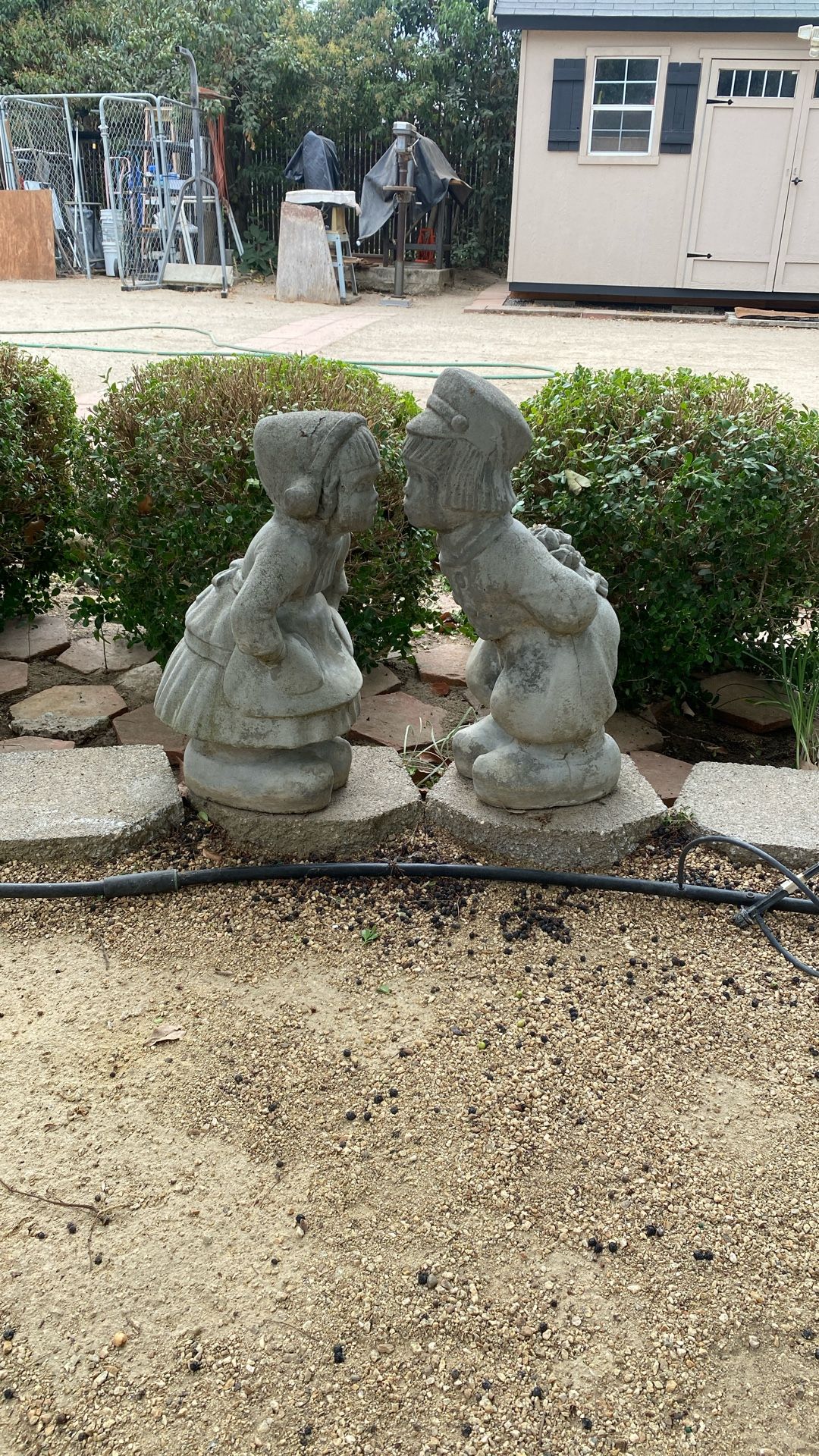 Cement Dutch statues very heavy 21 inches inches