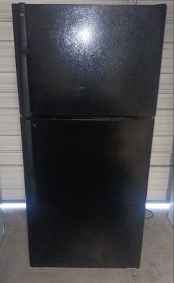 Black GE Refrigerator with working icemaker. 67X30X31.