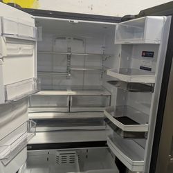 brand new GE profile stainless French door ice counter depth and water fridge original warranty