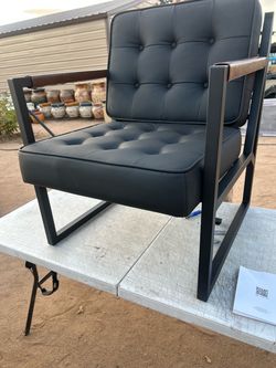 Black Tufted Leather Accent Chair with Metal Frame