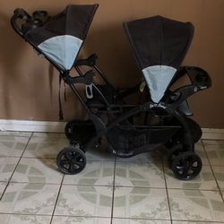 LIKE NEW BABY TREND SEAT AND STAND DOUBLE STROLLER!!!!