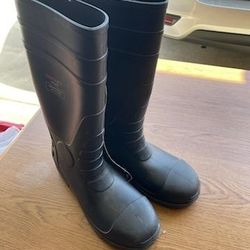 Steel toe rubber boots.