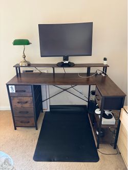 L-Shaped Desk with Monitor Stand and Power Outlet
