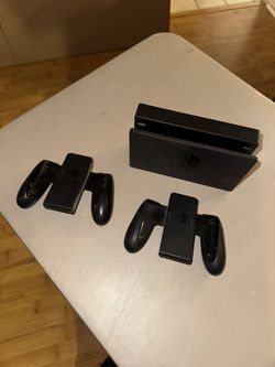 nintendo switch dock & 2 controller housings