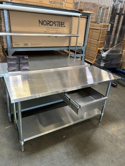 New Stainless steel prep table work station with optional drawer and wheels 