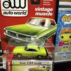 AUTO WORLD VINTAGE MUSCLE 1971 DODGE DART SWINGER GREEN 2013 NEW