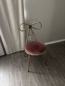 Pink gold bow vanity chair