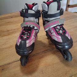 Pink and gray Schwinn inline skates in good condition. Adjustable  ABEC 5 
