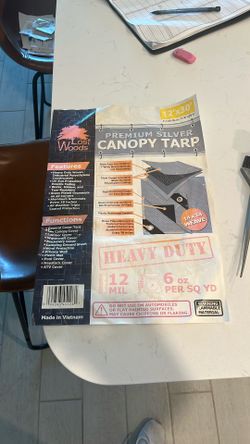 Trial 4 x 30’ canopy tarp with all metal rods and corners