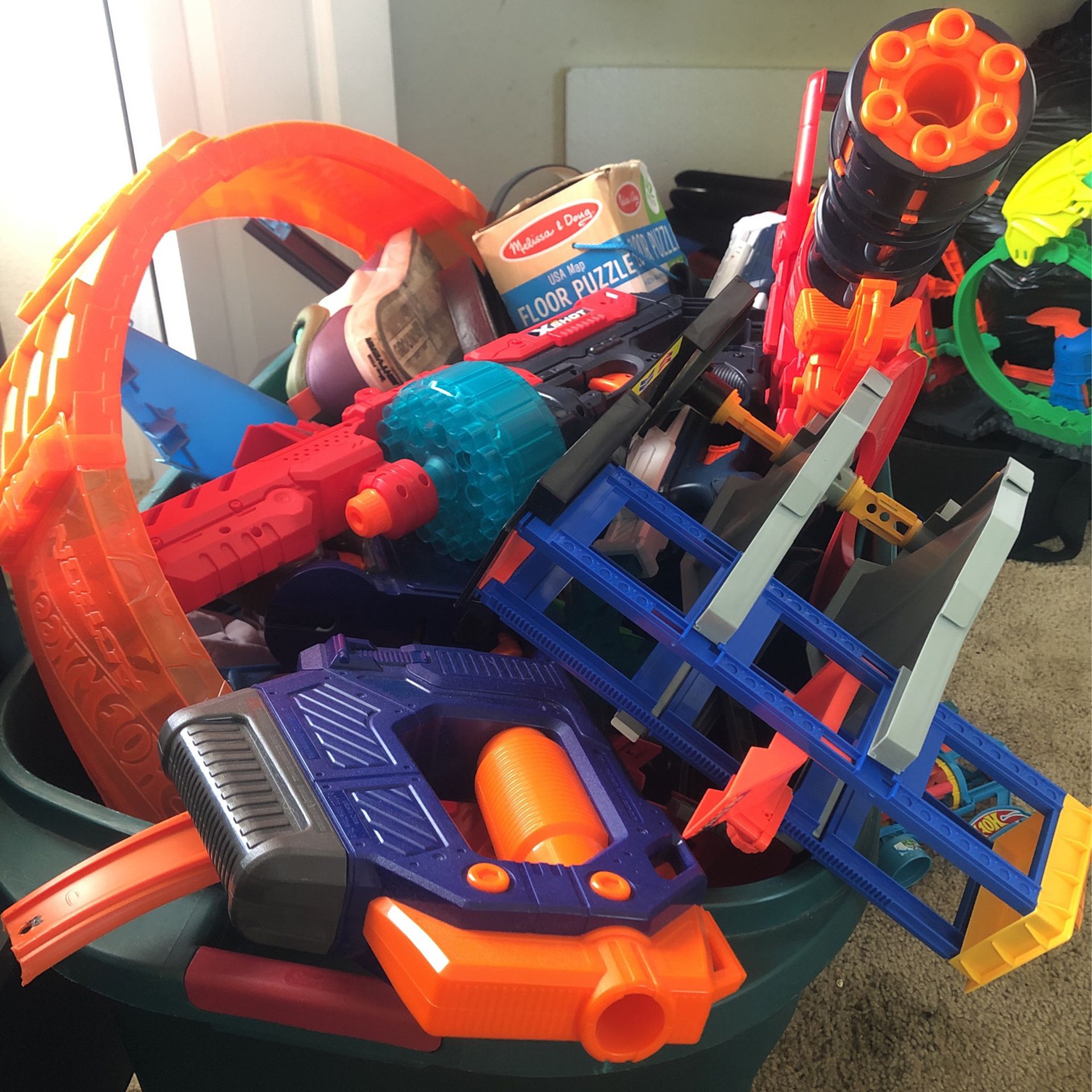 Bucket Overflowing With Random Toys