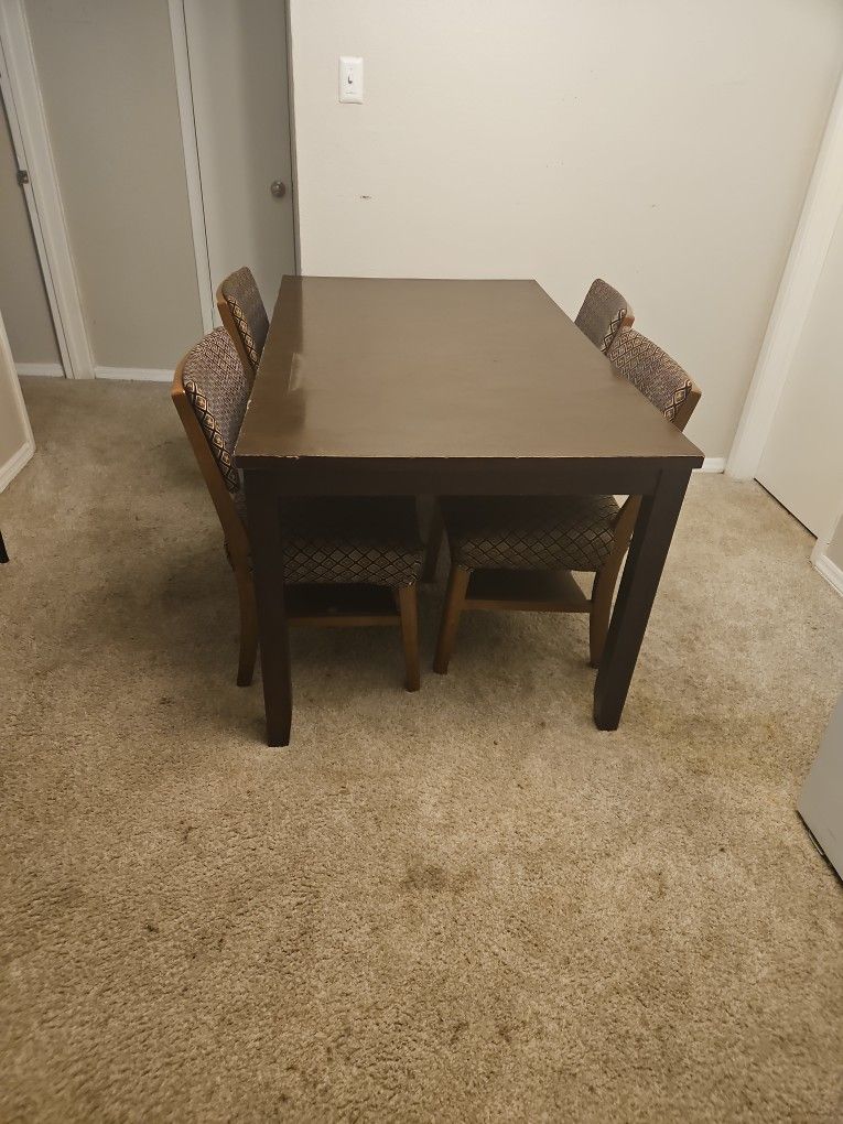 Table And Four Chairs