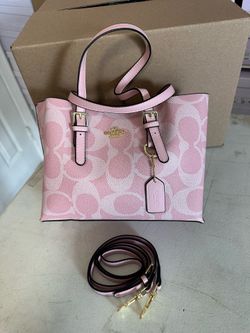 Coach pink purses with straps,