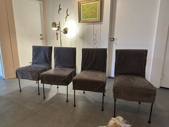 Set Of Four Steel Dining Chairs With Gray Velvet Slip Covers