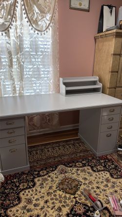 Table with eight drawers