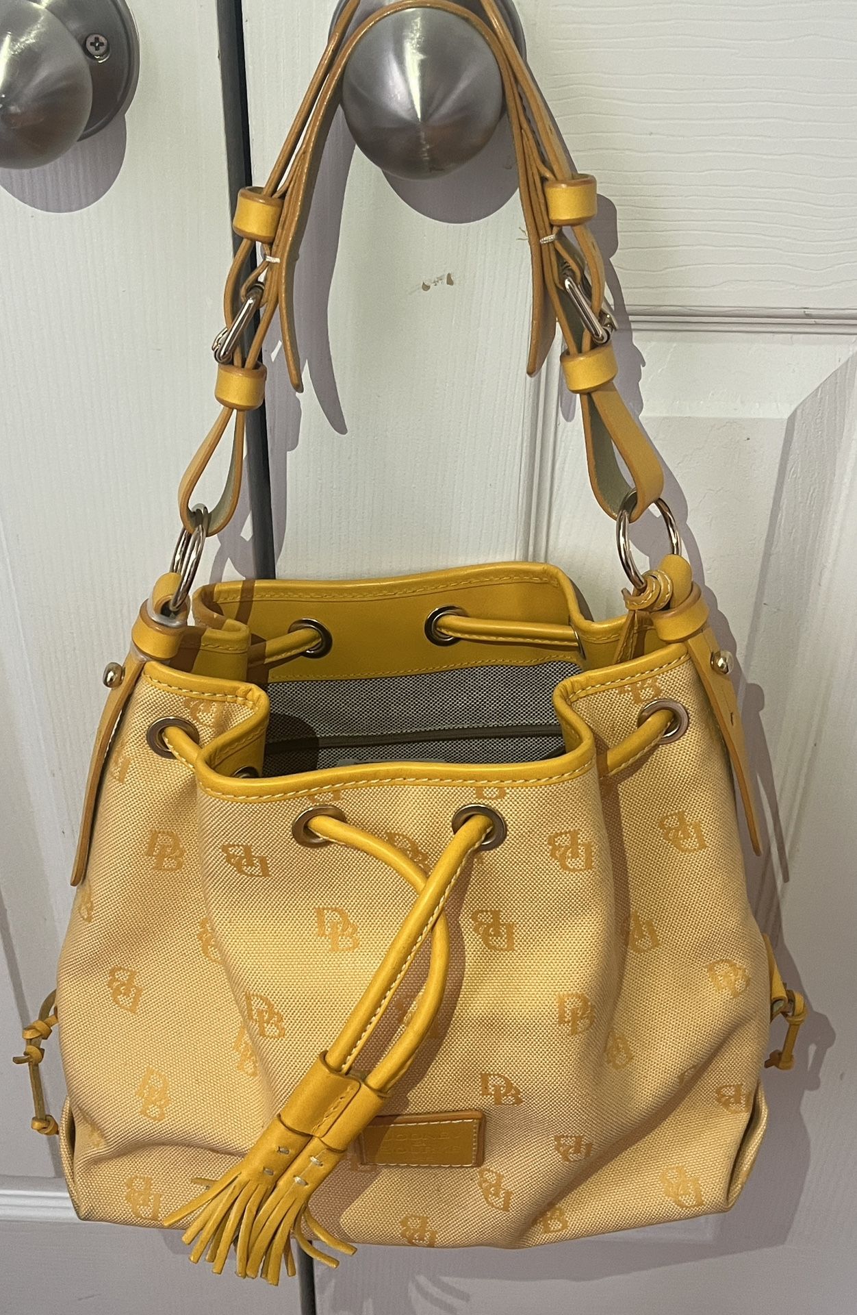 Dooney & Bourke Yellow Sunflower Drawstring Canvas Bucket Bag for Sale in  Atlanta, GA - OfferUp