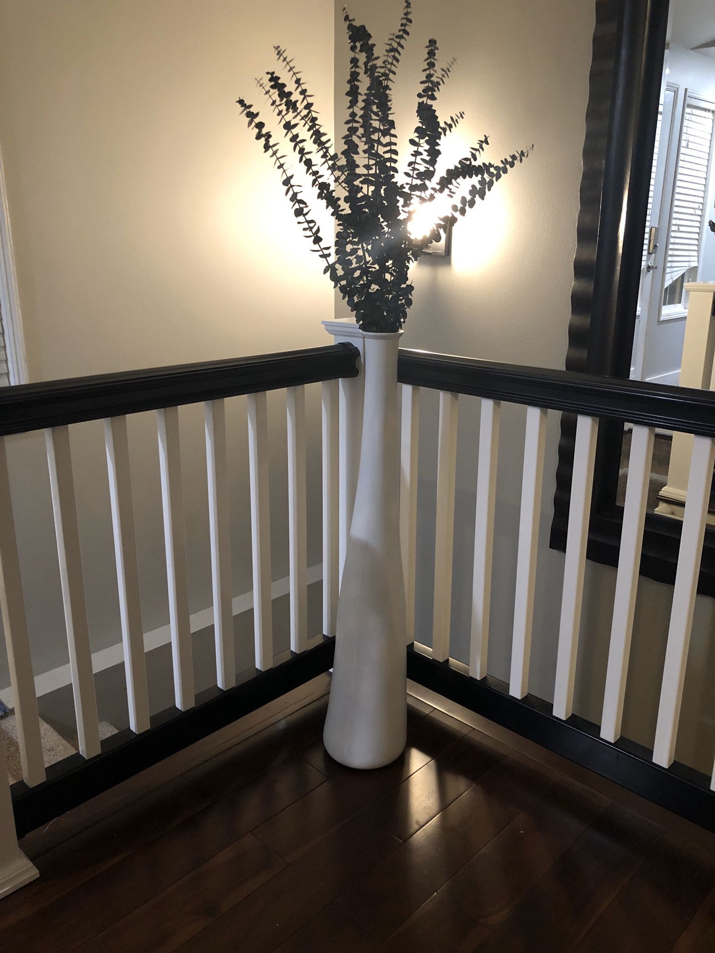 Tall glossy white vase