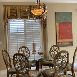 Dining Table, glass top with six chairs 