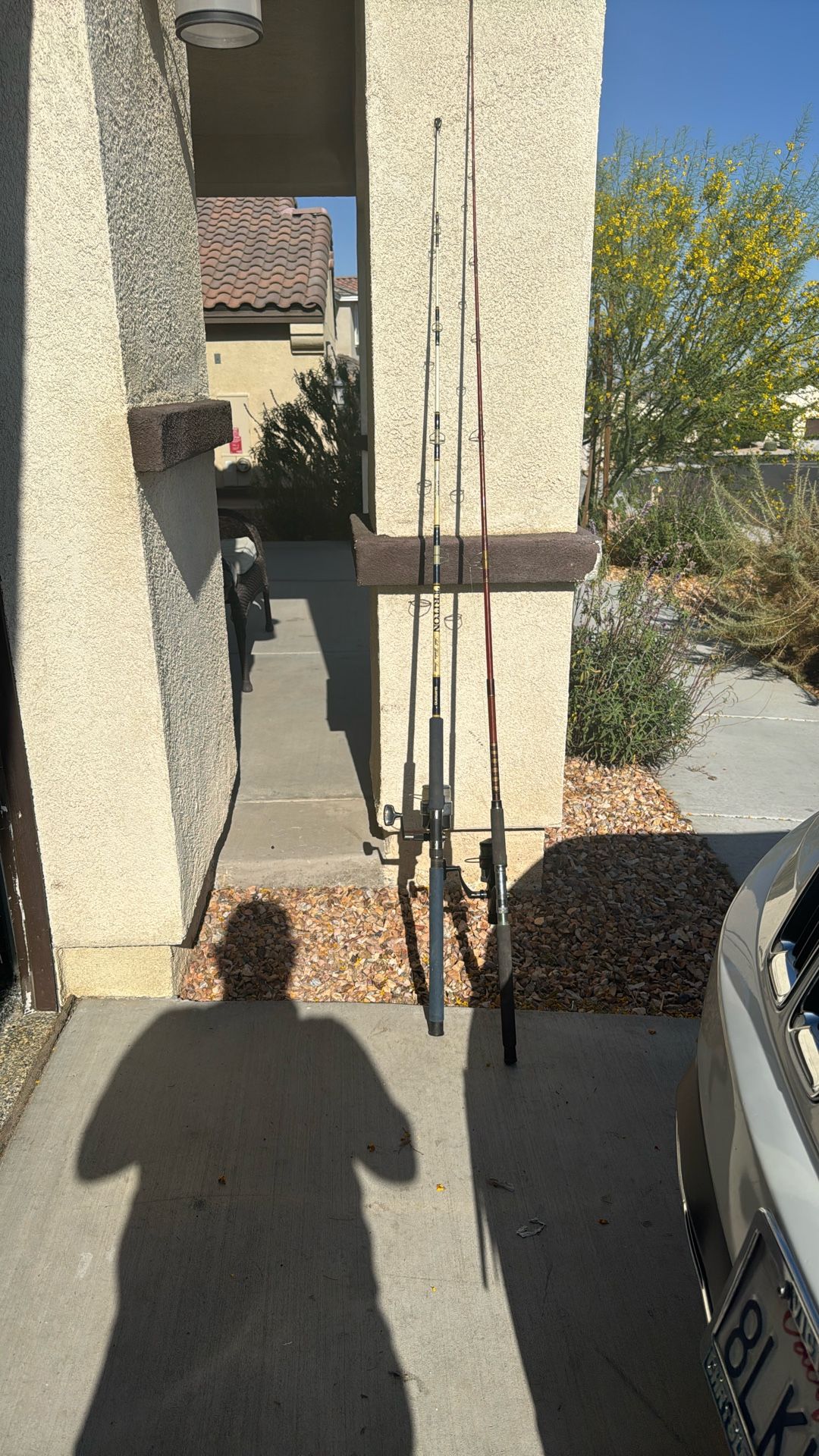 2 fishing rods and reels
