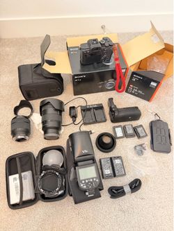 Sony Alpha 7 IV Mirrorless camera with accessories