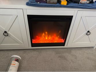 TV cabinet or stand with fireplace