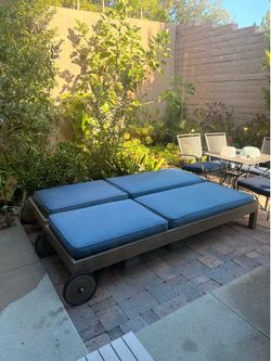 Outdoor Pottery Barn lounge chairs and storage unit
