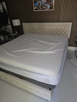 A king-size bed with its mattress