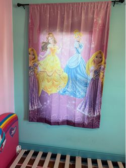 Kids twin bed frame with matching window curtain