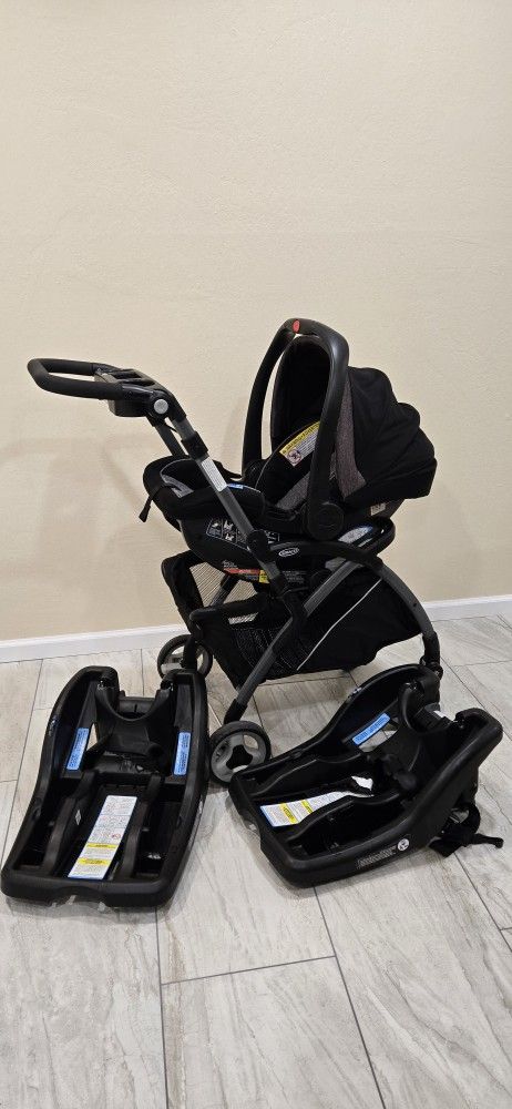 Set of Graco Snugride Snuglock 35 Infant Car Seat with two car adapters and a folding travel stroller.