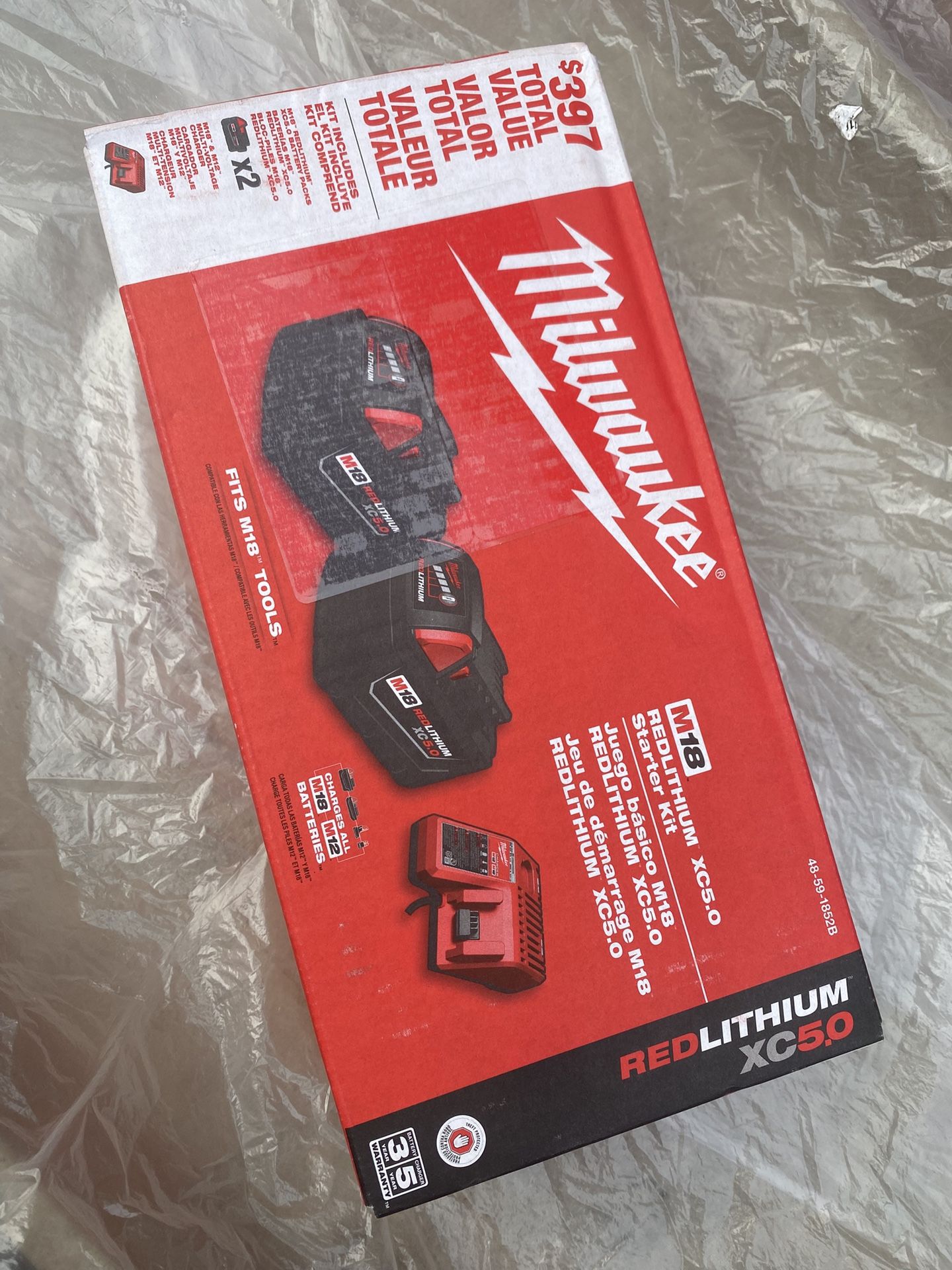 Milwaukee Battery 🔋 Set 2 PCs 5.0 And Charger 🔌
