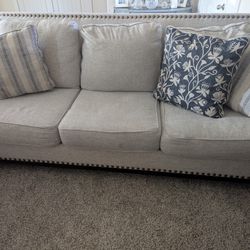 Two Ashley Furniture Sofas