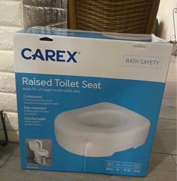 Raised toilet seat new in box