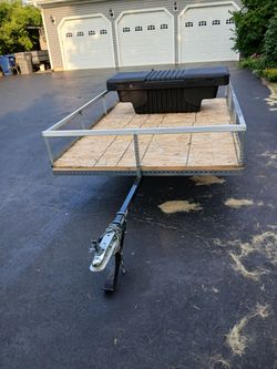 65 across 8 ft long bed trailer it is brand new the toolbox for a truck is like brand new