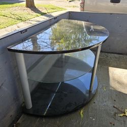 Very nice t v stand.... Moving, and don't have room to take it.