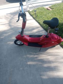 Scooter eléctrica para niños en buenas condiciones