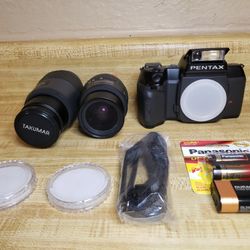 Pentax SF-10 SLR camera with 2 lenses and Misc 