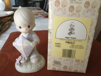 19-Precious moments porcelain figurines w/ original boxes.