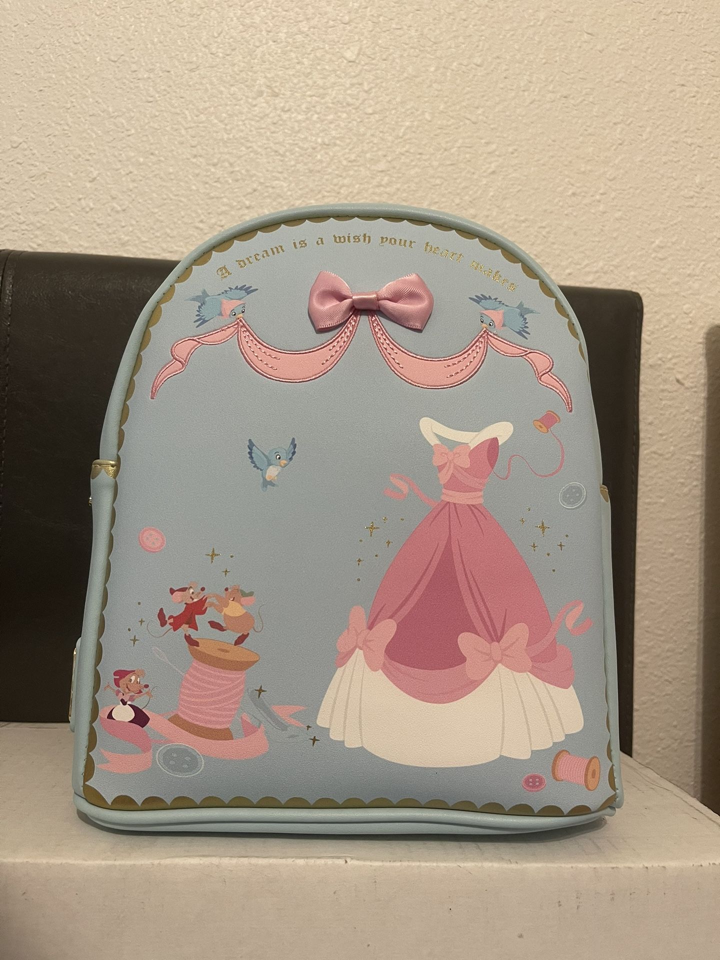 Loungefly Disney Cinderella Blue Sewing Pink Ribbon Backpack