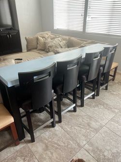Back couch table with chairs
