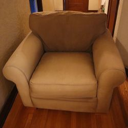Beige Armchair with Matching Ottoman – Comfortable & Neutral