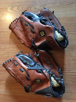 2 WILSON BASEBALL GLOVES. LIKE NEW. $40 EACH