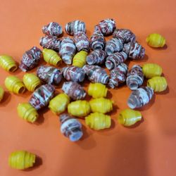 Recycled Paper For Beads. Each Packet Contains 40 assorted  and color coordinated  beads for jewelry  making. Also a bonus pack.